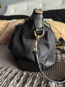 Black Gucci two way bag with strap
