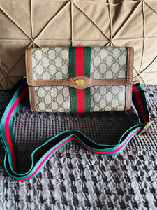 Gucci clutch with crossbody conversion