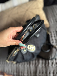 Black Gucci two way bag with strap